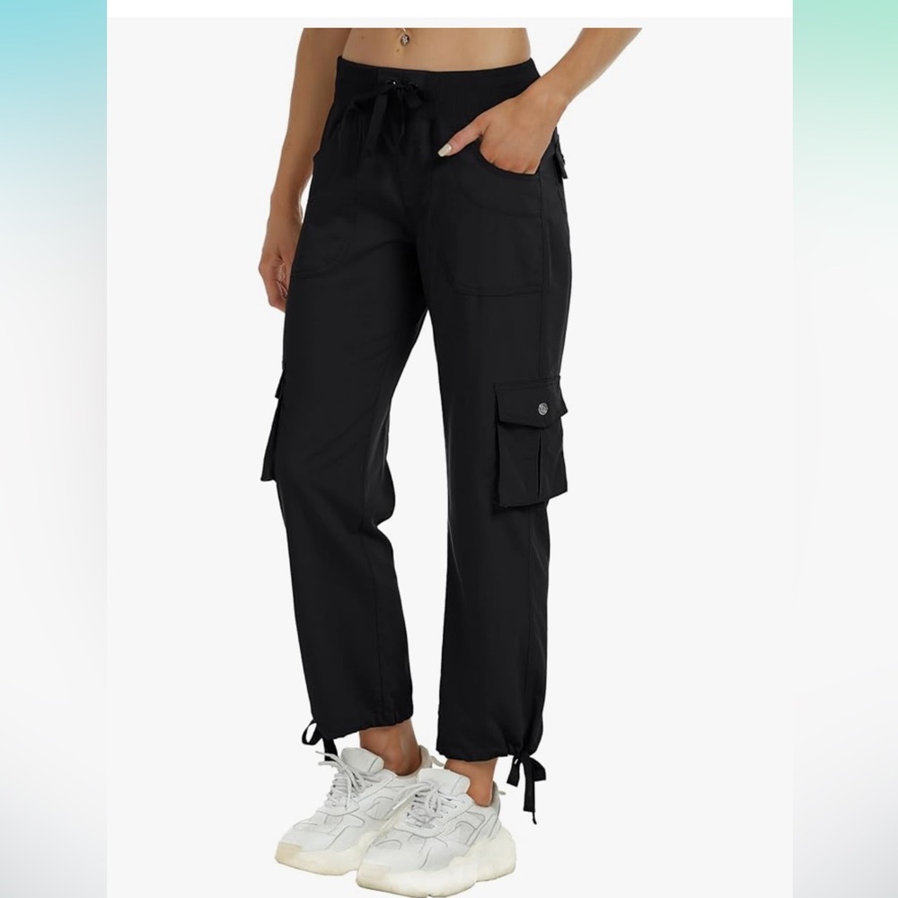 Black cargo pants  with Jogger Style. Size S